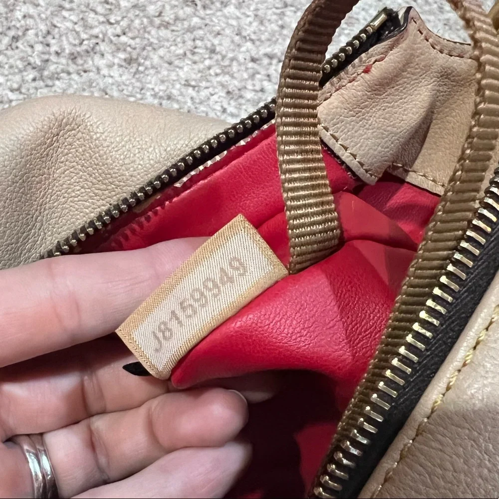 Dooney & Bourke tan and Black Leather Hobo Bag